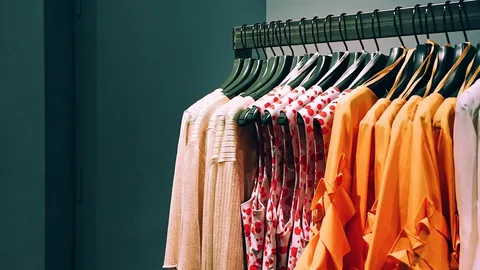 Models wearing custom hoodies, t-shirts and casual jackets