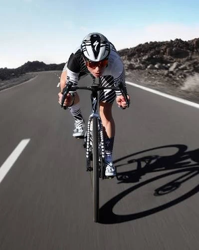 Compression tops and cycling jerseys in custom team colours